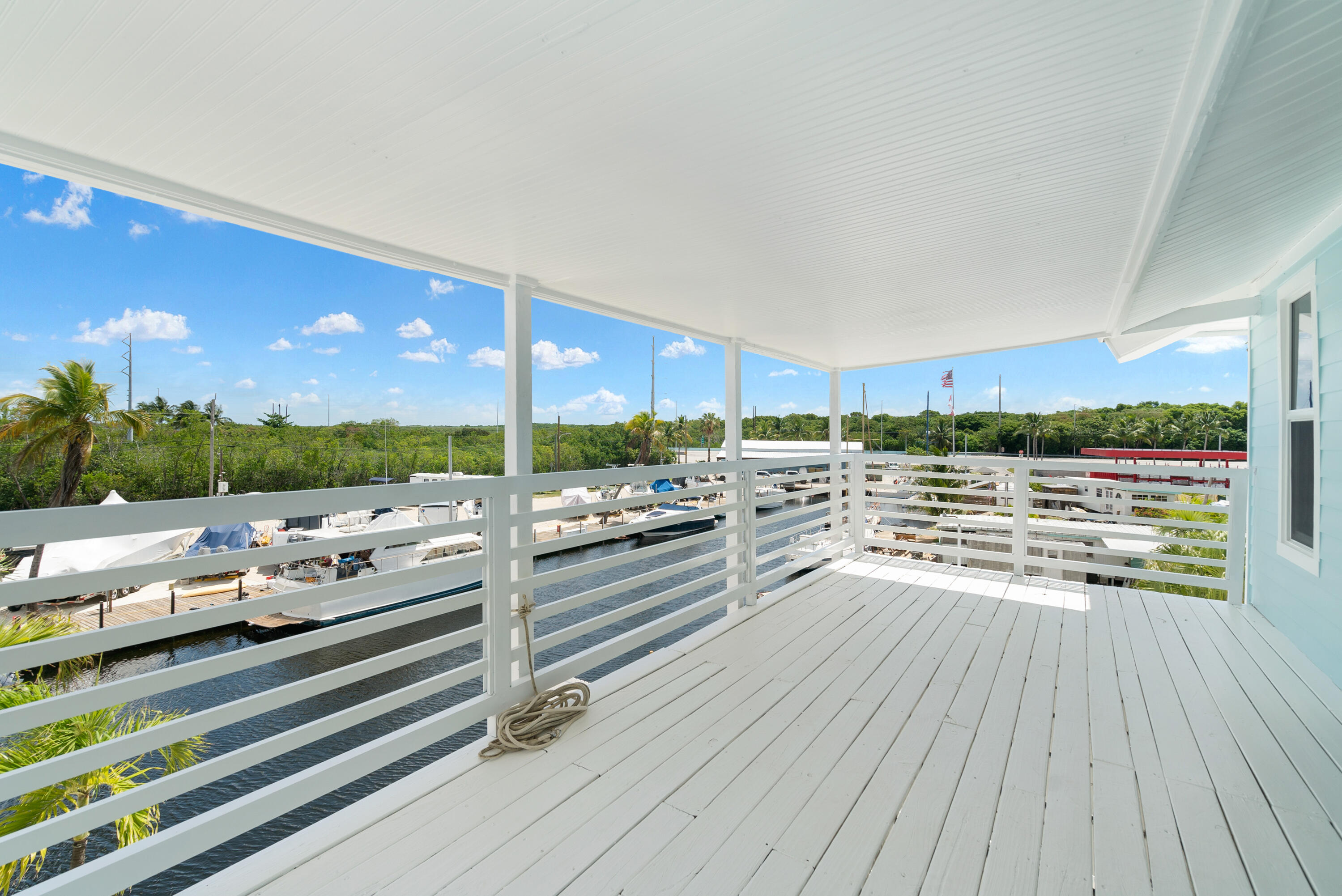415 Big Pine Road Key Largo, FL 33037 - Photo 26 of 35 a view of a living room and balcony