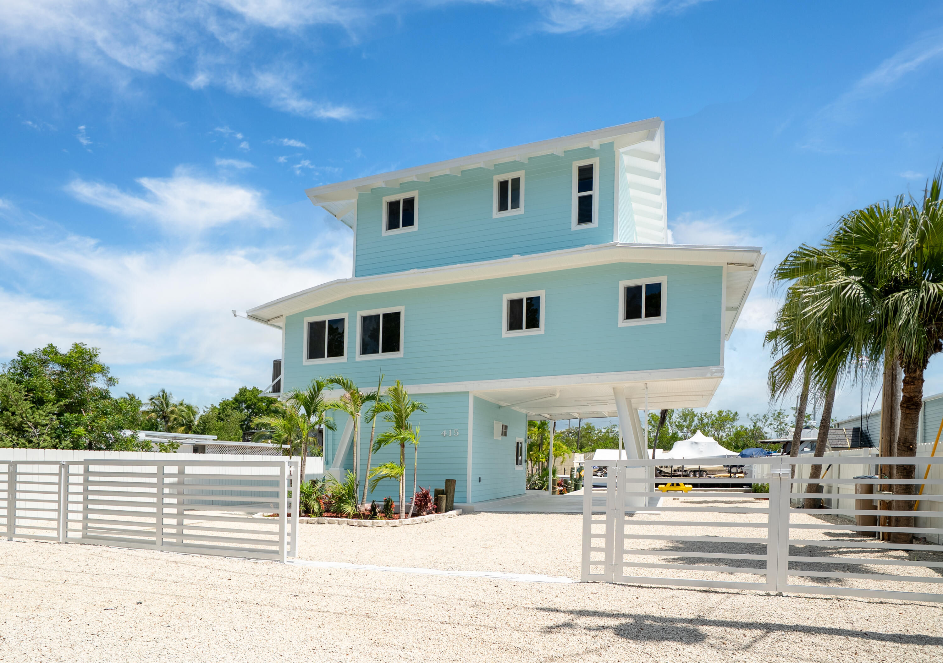 415 Big Pine Road Key Largo, FL 33037 - Photo 29 of 35 a view of a house with a patio