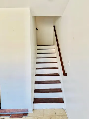 a view of entryway with stairs