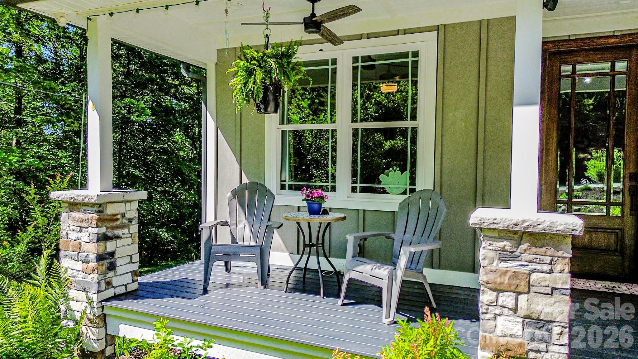 278 Hunters Trace Rutherfordton, NC 28139 - Photo 4 of 33 a view of an chairs and table in a patio