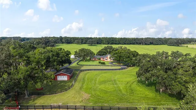 a view of a lake with a yard