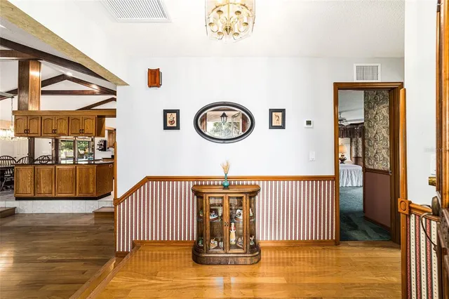 a view of a hallway with entryway