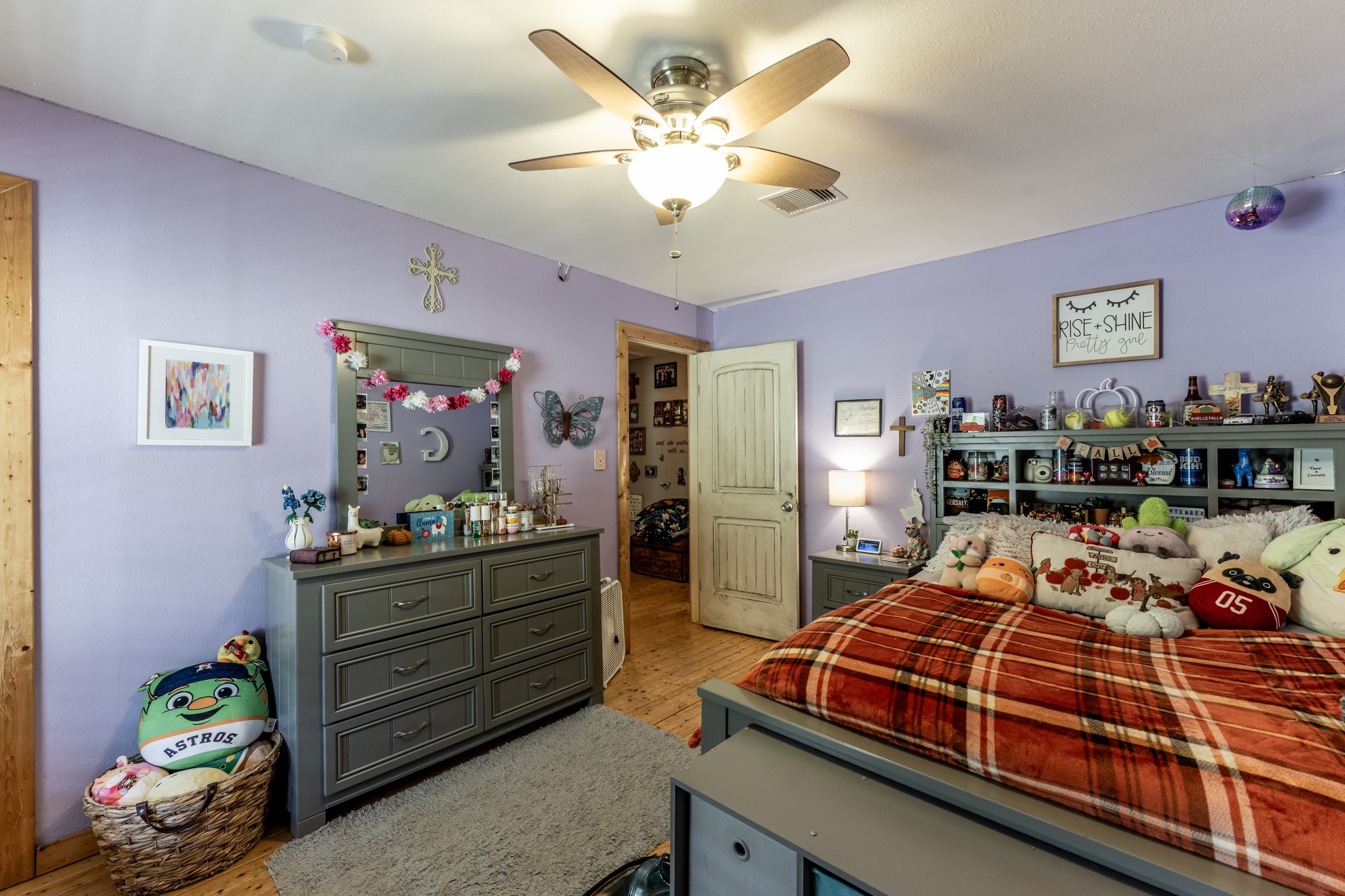 230 Thomas Creek Road Cleveland, TX 77328 - Photo 20 of 28 a bedroom with a bed and ceiling fan