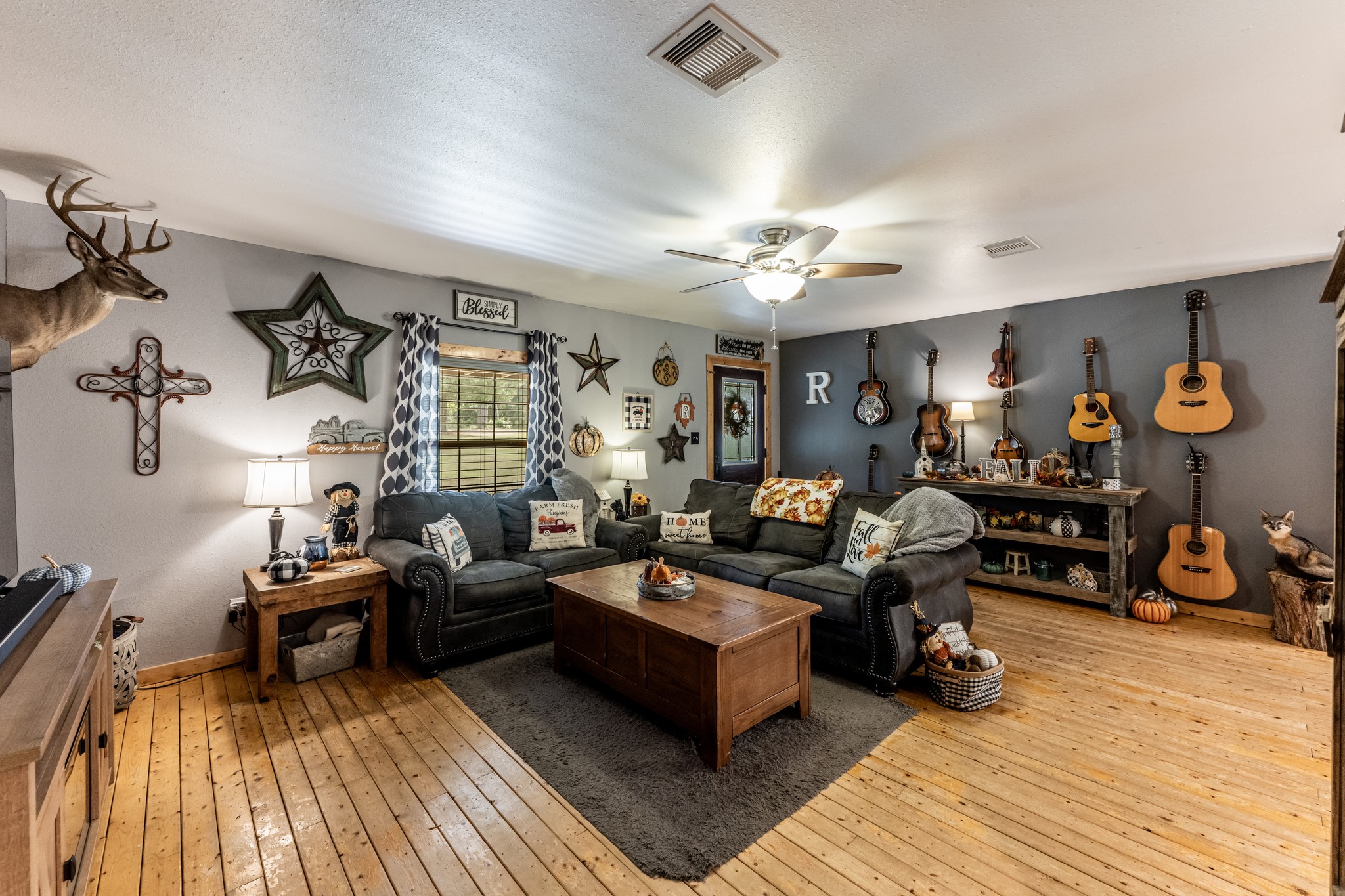 230 Thomas Creek Road Cleveland, TX 77328 - Photo 6 of 28 a living room with furniture and a wooden floor