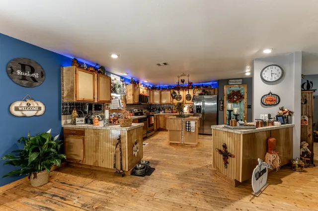 a living room with furniture and a clock