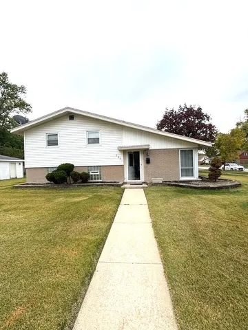 a swimming pool view with a outdoor seating
