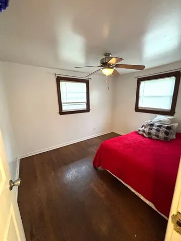 a kitchen with a refrigerator and a stove