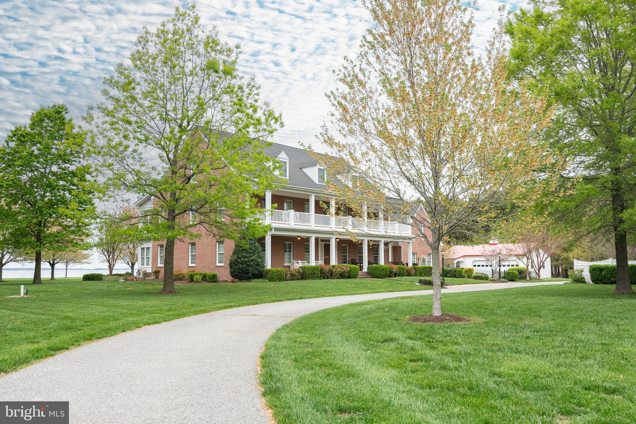 a view of a house with a big yard
