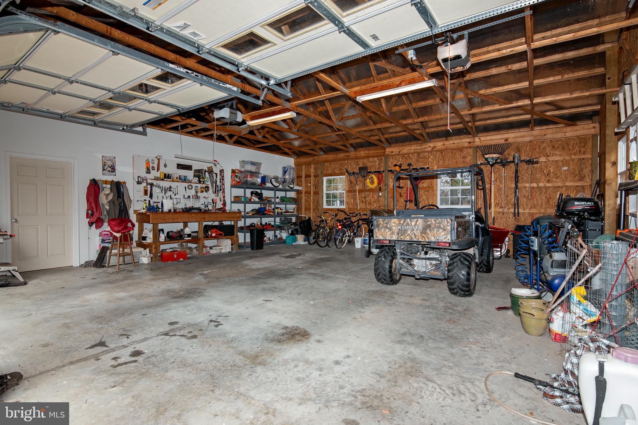 8781 Tilghman Island Road Wittman, MD 21676 - Photo 53 of 60 a view of parking garage with cars