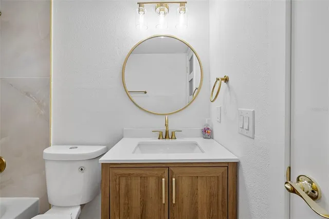 a view of a swimming pool with a lounge chair