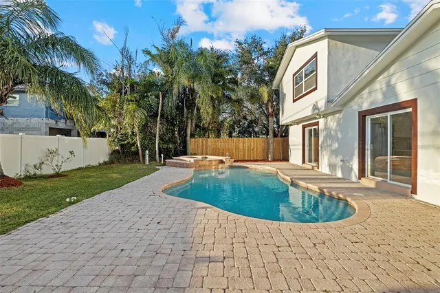 an aerial view of a house with a garden