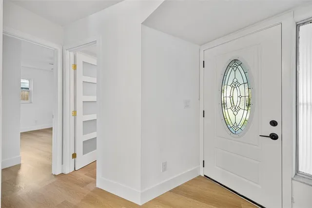 a stove top oven sitting inside of a kitchen