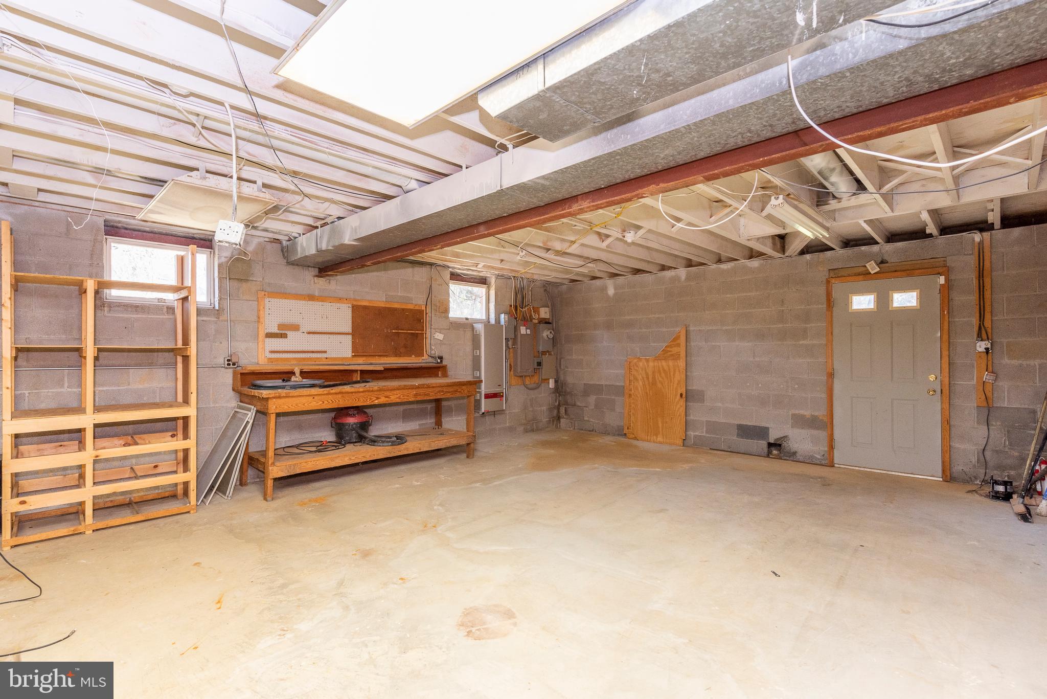 5013 Durham Road West Columbia, MD 21044 - Photo 35 of 37 Huge Unfinished Basement Workshop/Storage
