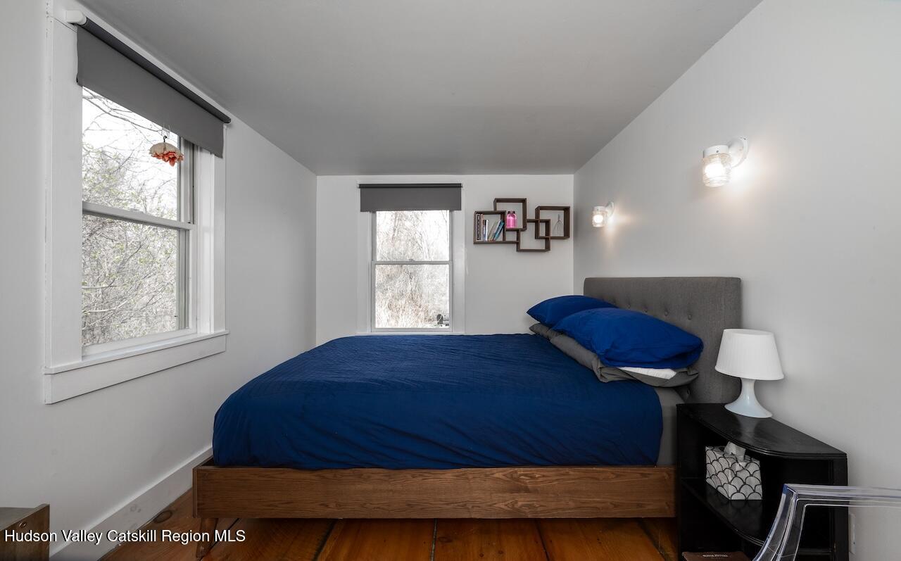 17 Rothvoss Road Ancramdale, NY 12503 - Photo 11 of 16 a bedroom with a bed and window