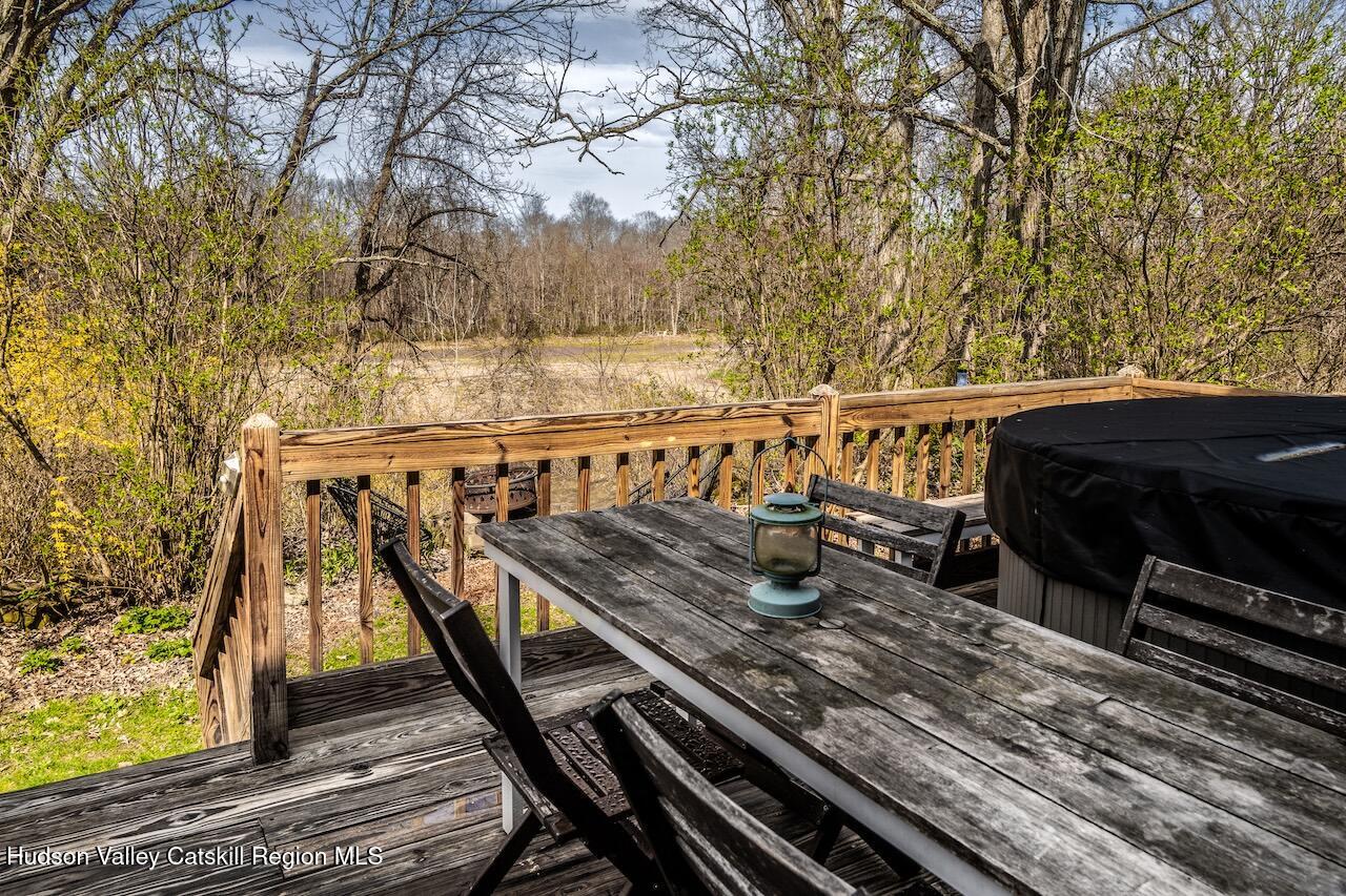 17 Rothvoss Road Ancramdale, NY 12503 - Photo 3 of 16 a view of a roof deck with wooden floor and fence