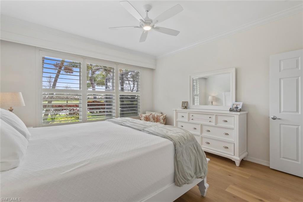 5868 Constitution Street Ave Maria, FL 34142 - Photo 13 of 33 a bedroom with a bed and a window