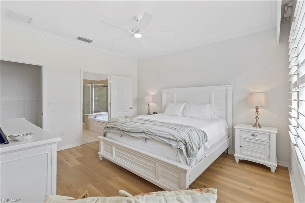5868 Constitution Street Ave Maria, FL 34142 - Photo 14 of 33 a bedroom with a bed and a couch