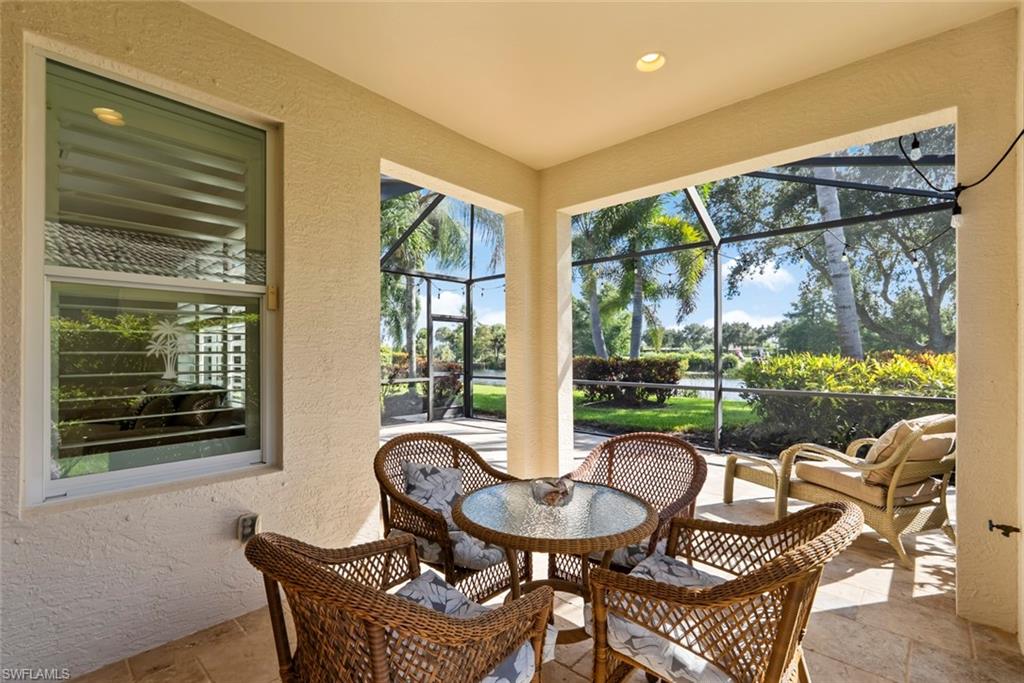 5868 Constitution Street Ave Maria, FL 34142 - Photo 21 of 33 a dining room with furniture and a window