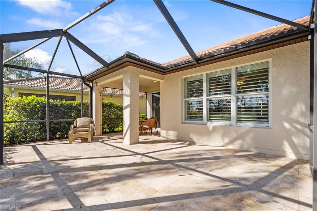 5868 Constitution Street Ave Maria, FL 34142 - Photo 22 of 33 a view of a house with backyard and porch