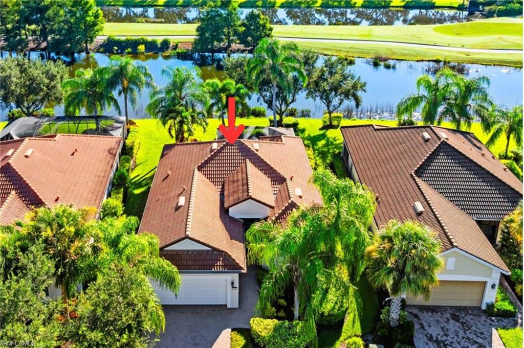 5868 Constitution Street Ave Maria, FL 34142 - Photo 25 of 33 an aerial view of a house with a swimming pool yard and outdoor seating