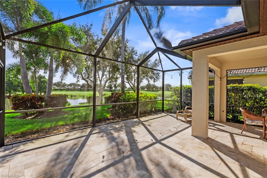 5868 Constitution Street Ave Maria, FL 34142 - Photo 3 of 33 a view of a backyard with a garden and plants