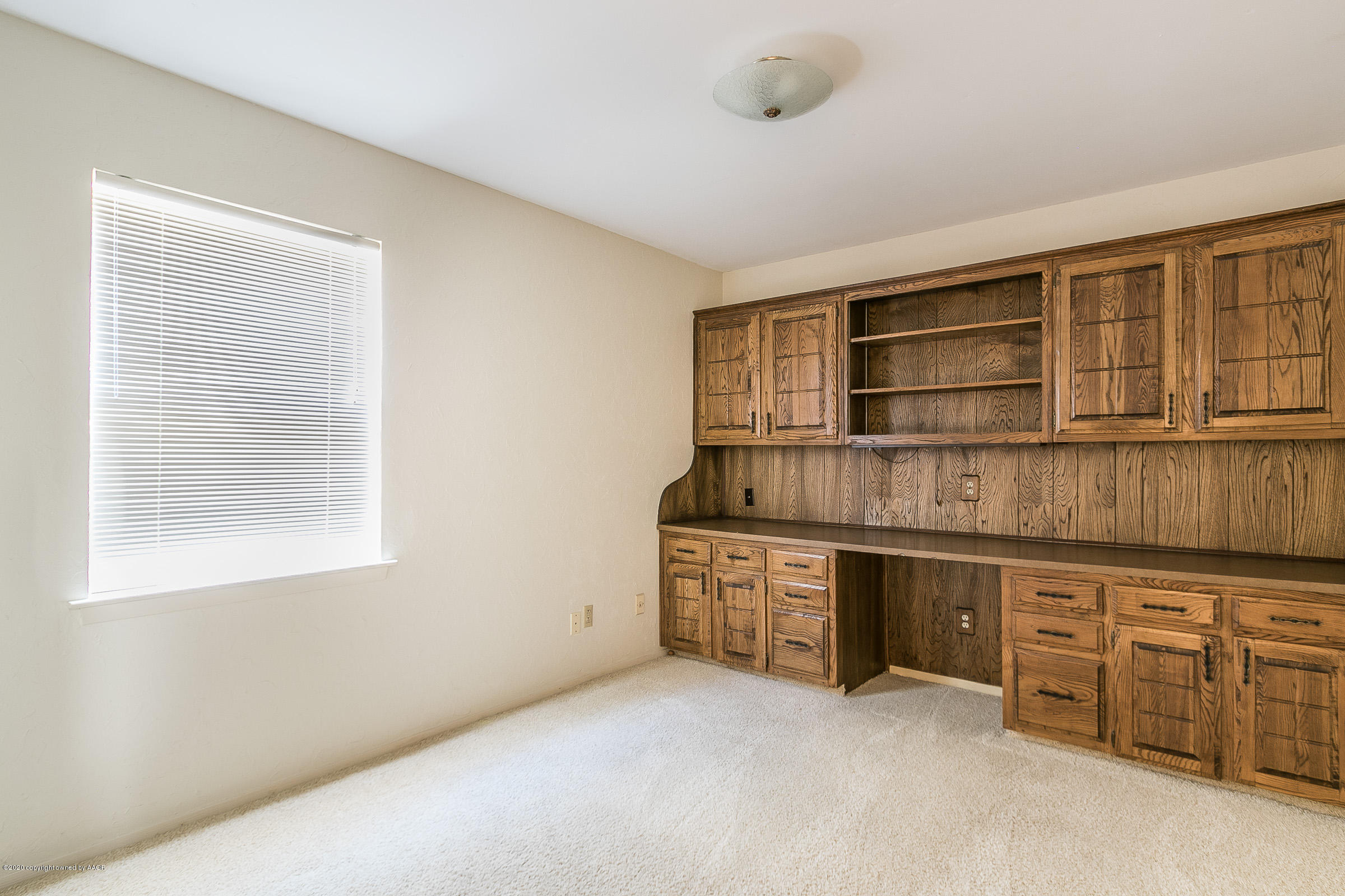 4609 Journey Street Amarillo, TX 79110 - Photo 17 of 30 an empty room with furniture