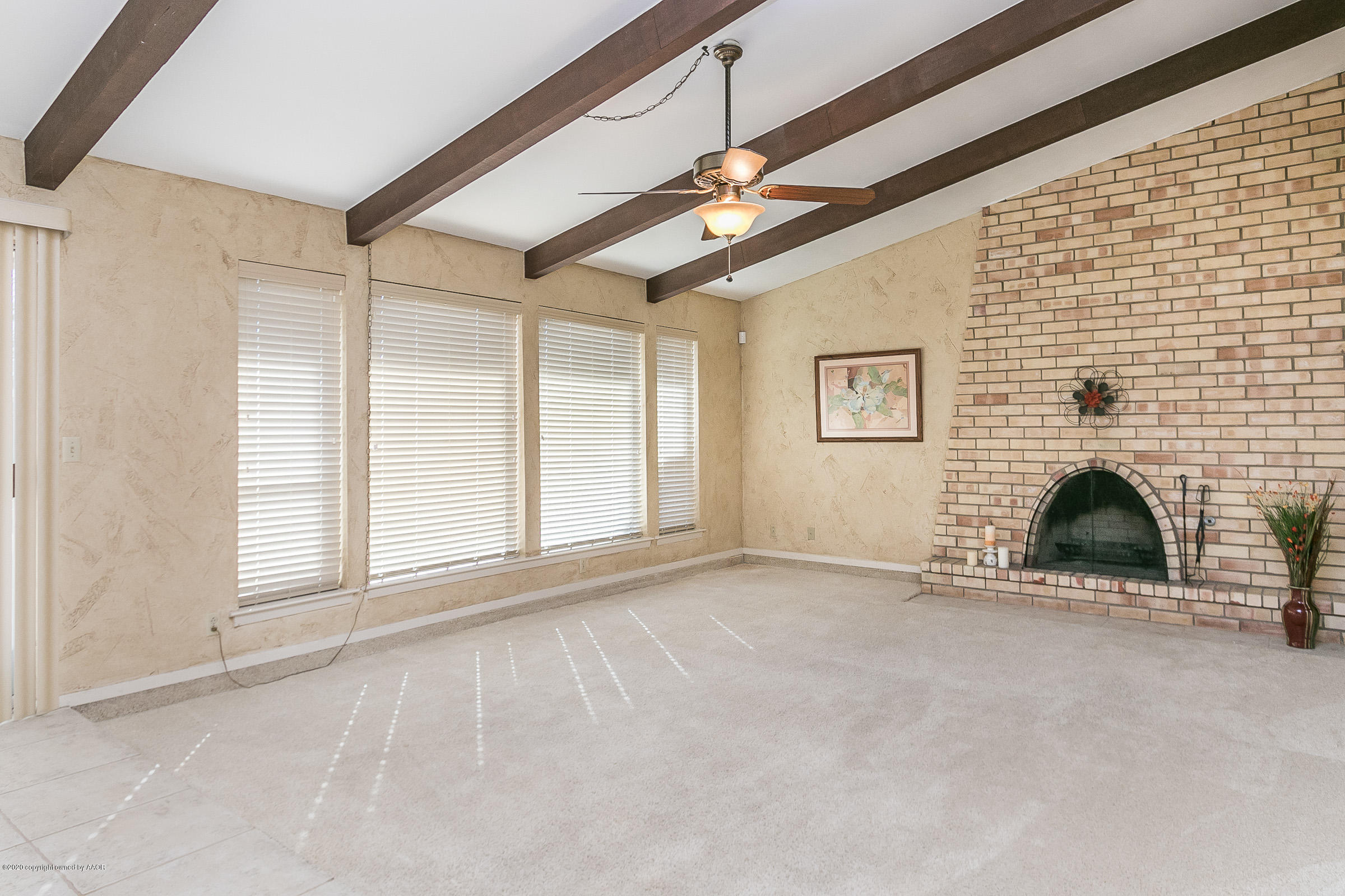 4609 Journey Street Amarillo, TX 79110 - Photo 4 of 30 a view of an empty room with a window