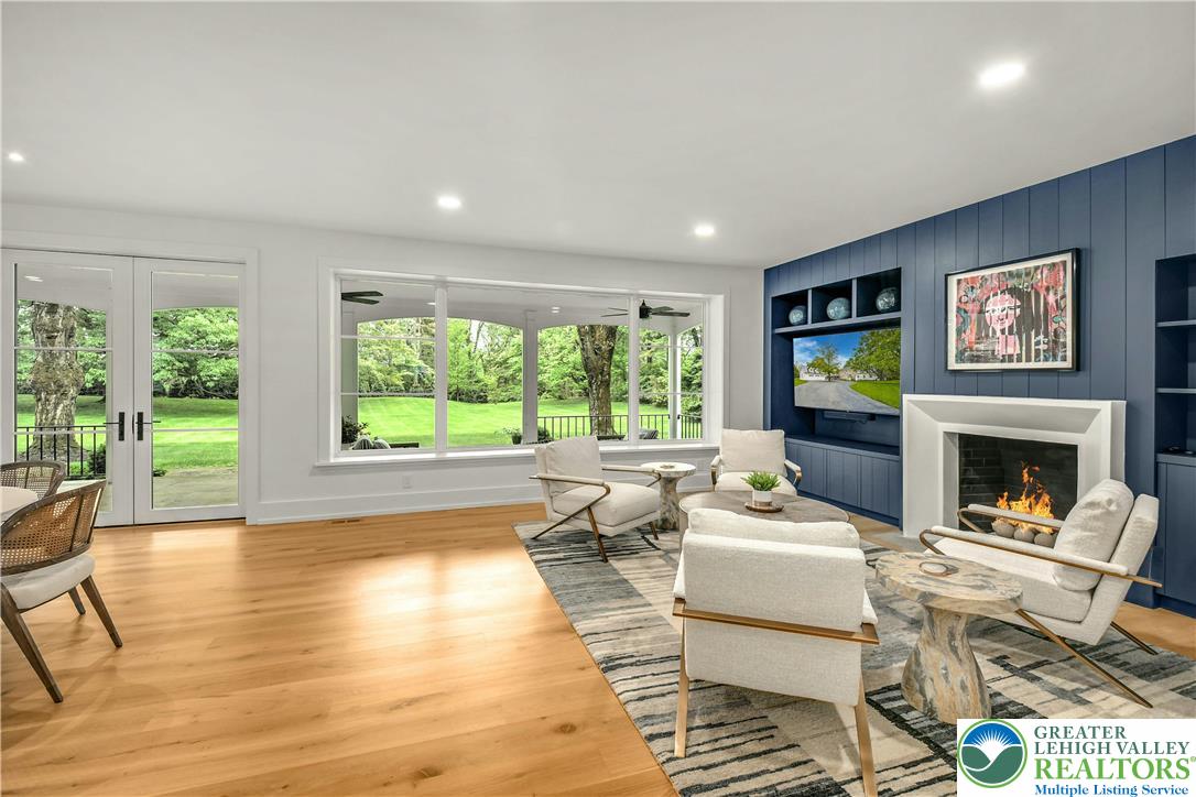 1803 Apple Tree Lane Bethlehem, PA 18015 - Photo 11 of 47 a living room with fireplace furniture and a large window