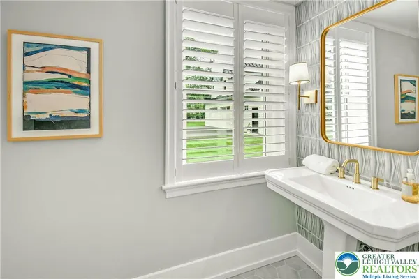 a view of a swimming pool with lounge chair