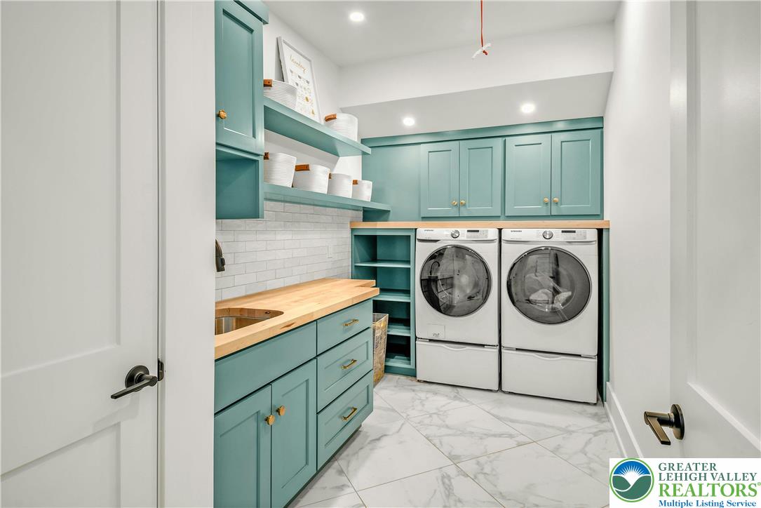 1803 Apple Tree Lane Bethlehem, PA 18015 - Photo 21 of 47 a utility room with sink dryer and washer
