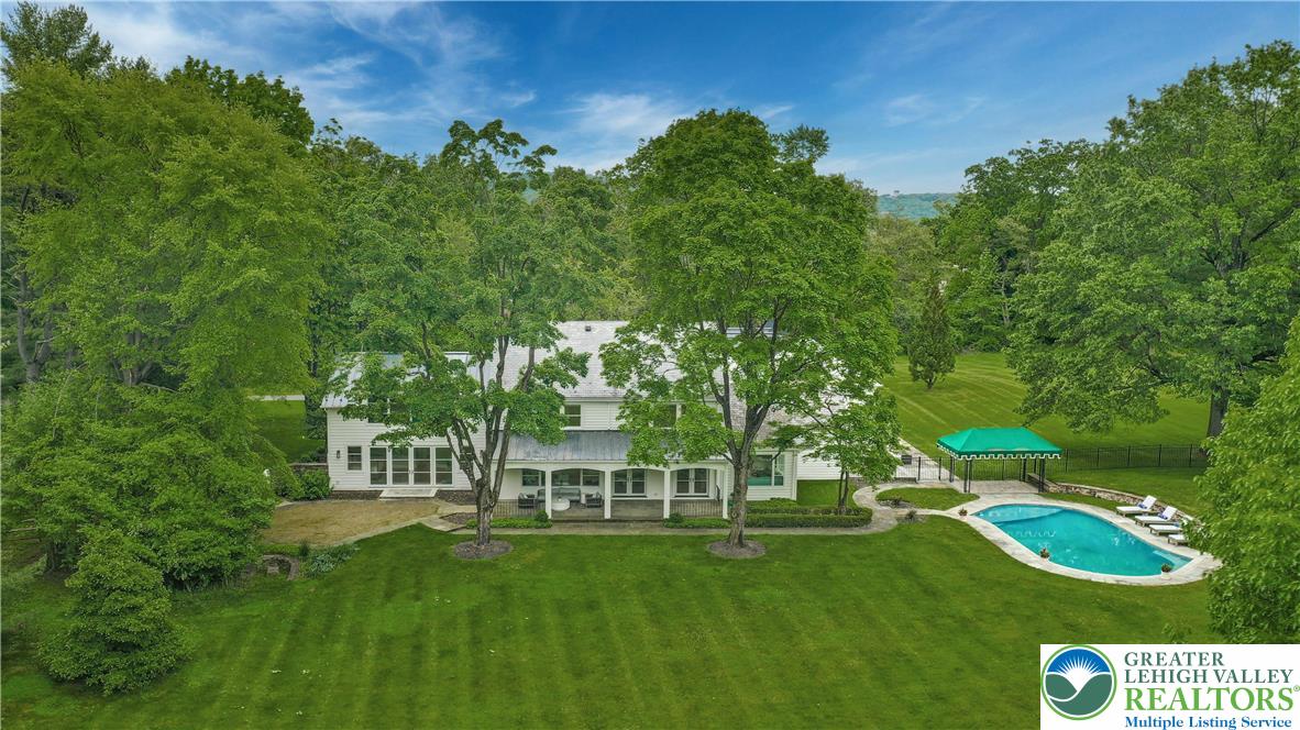 1803 Apple Tree Lane Bethlehem, PA 18015 - Photo 34 of 47 a view of a big yard with plants and large trees