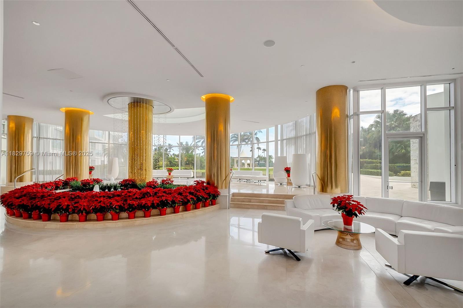 5151 Collins Avenue, Unit 729 Miami Beach, FL 33140 - Photo 17 of 35 a living room with furniture and floor to ceiling windows