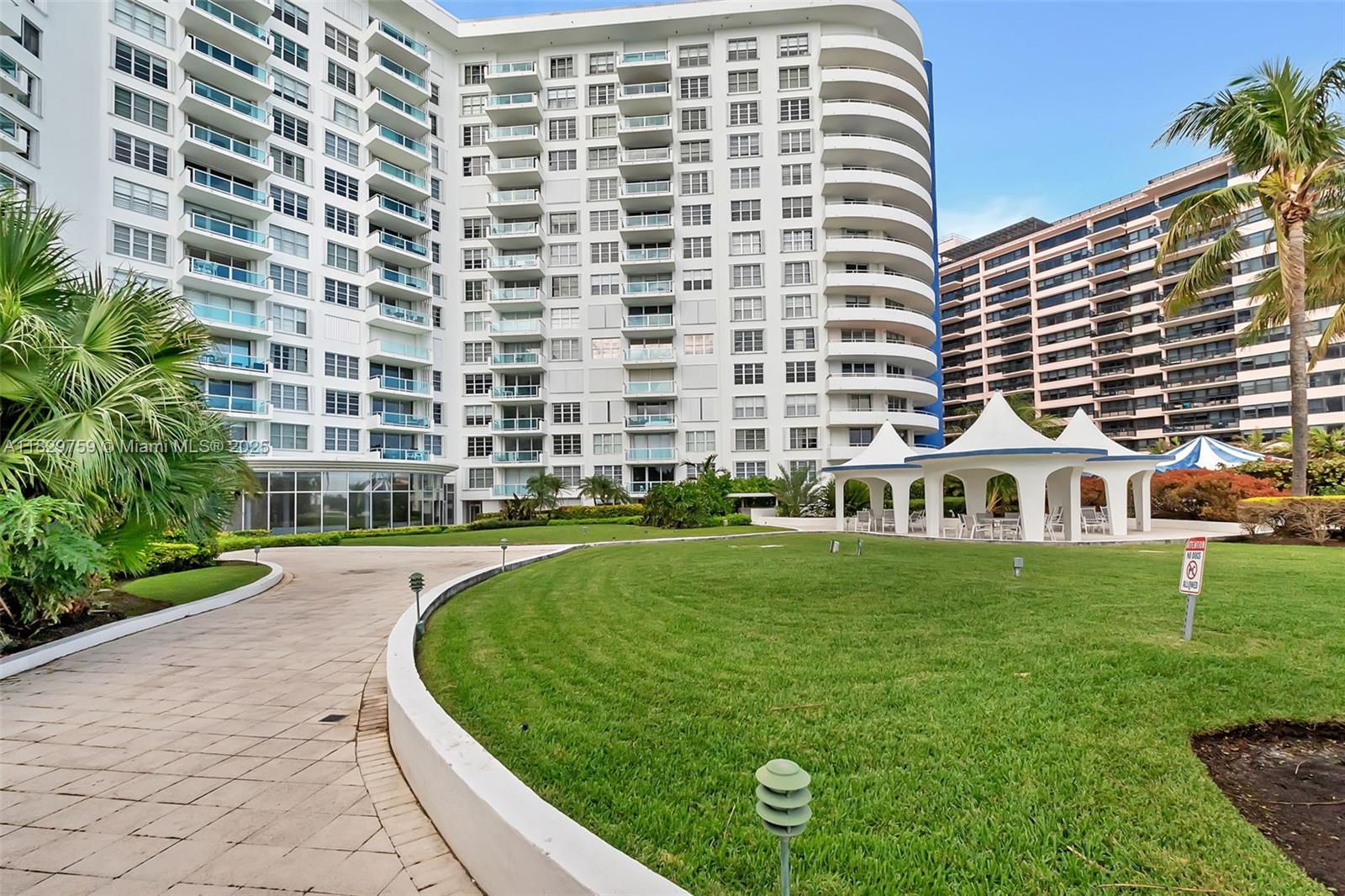 5151 Collins Avenue, Unit 729 Miami Beach, FL 33140 - Photo 23 of 35 front view of a building