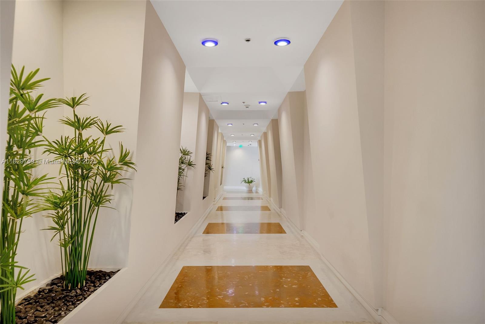 5151 Collins Avenue, Unit 729 Miami Beach, FL 33140 - Photo 31 of 35 a bathroom with a sink and a mirror