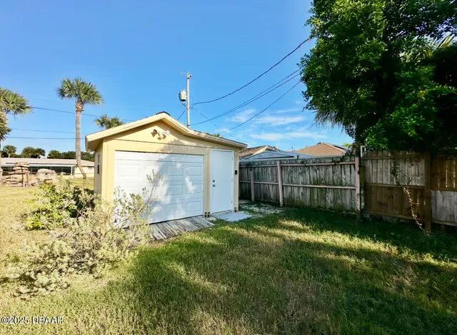 a view of a back yard of the house