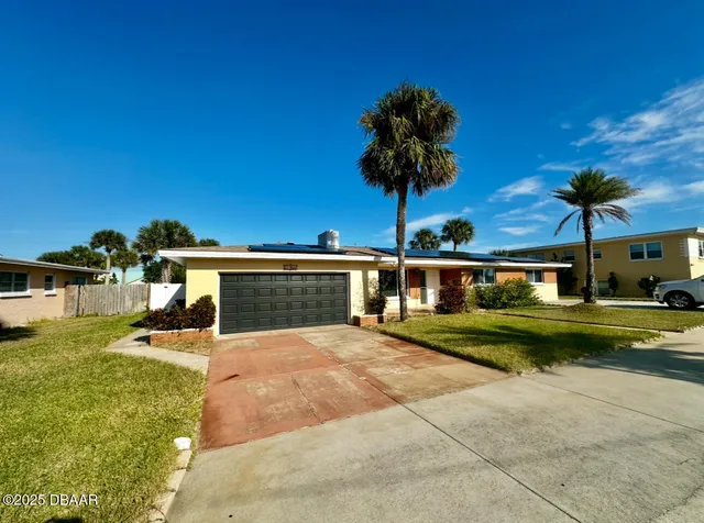 a view of swimming pool with a yard