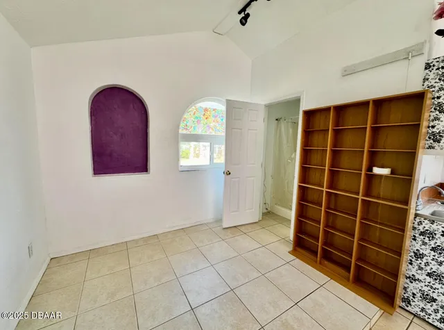 a view of front door with wooden floor