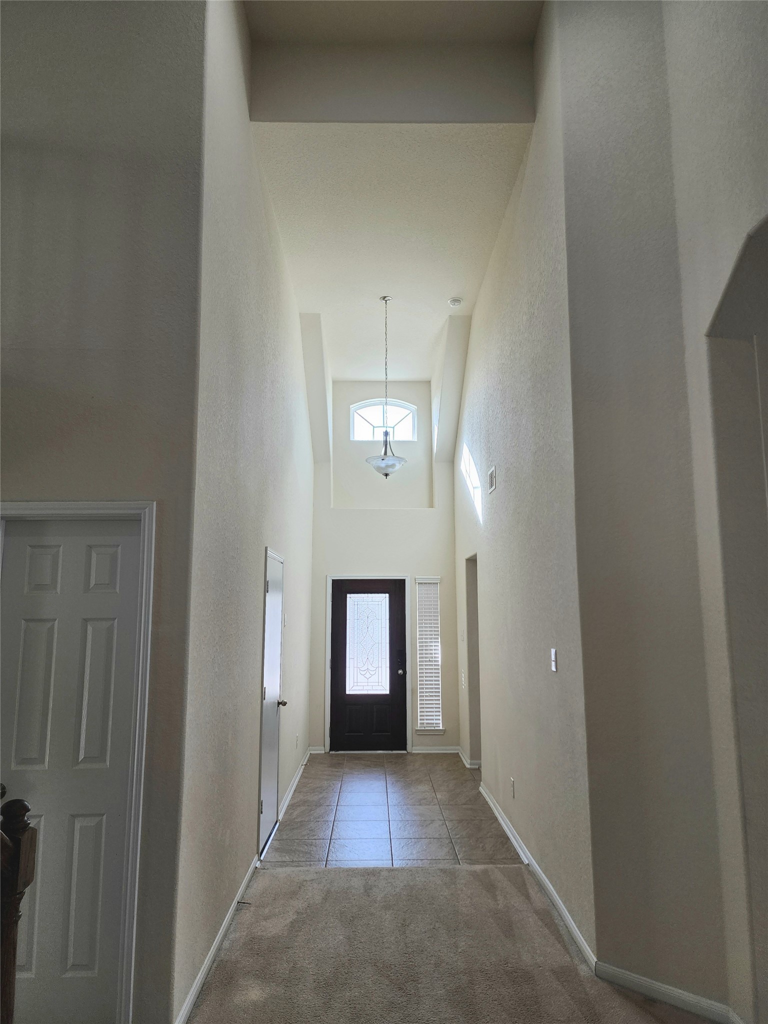5427 Seabird Street Baytown, TX 77521 - Photo 3 of 34 soaring ceilings welcome you to 5427 Seabird