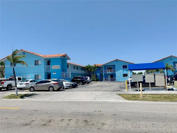 a car parked in front of a building