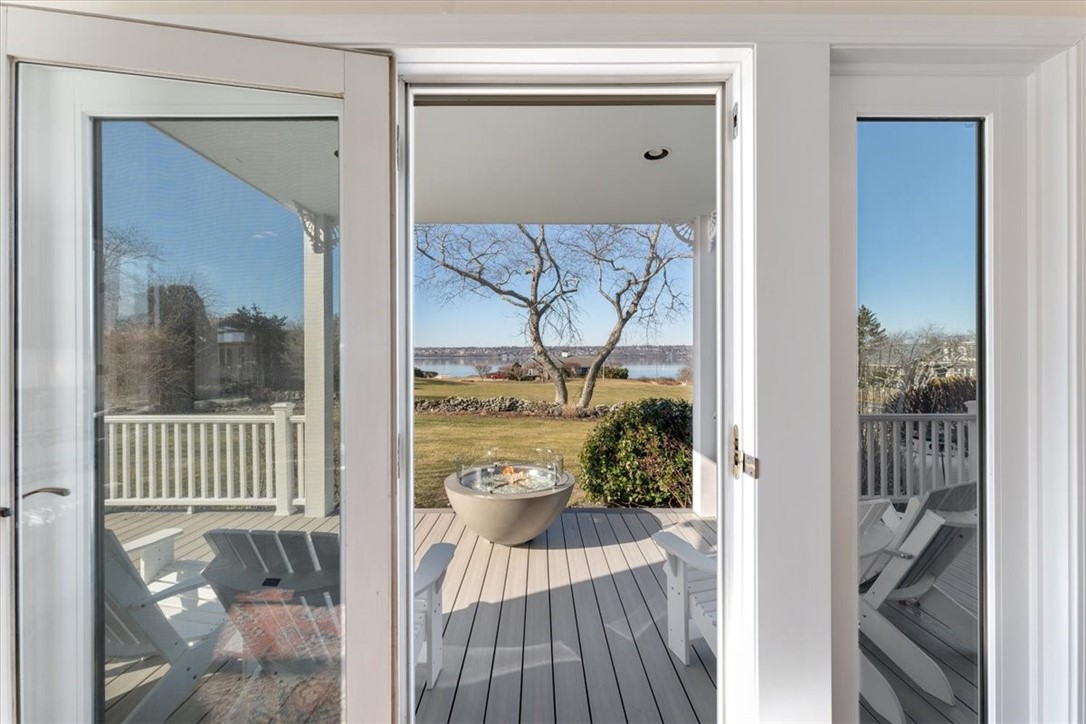 24 Little Harbor Road Tiverton, RI 02878 - Photo 14 of 46 Living room slider to deck.