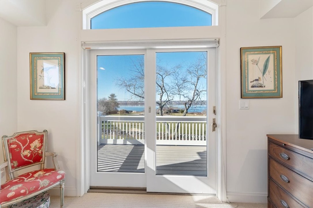 24 Little Harbor Road Tiverton, RI 02878 - Photo 25 of 46 Master bedroom with deck with waterview.
