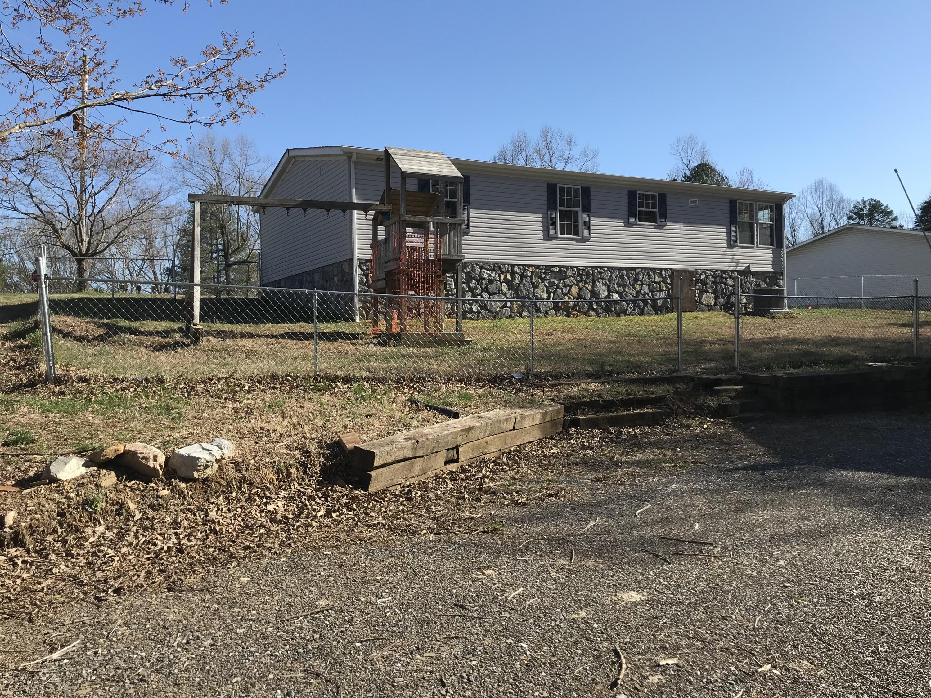 100 Deerhill Road Goodview, VA 24095 - Photo 2 of 7 a view of a house with a yard