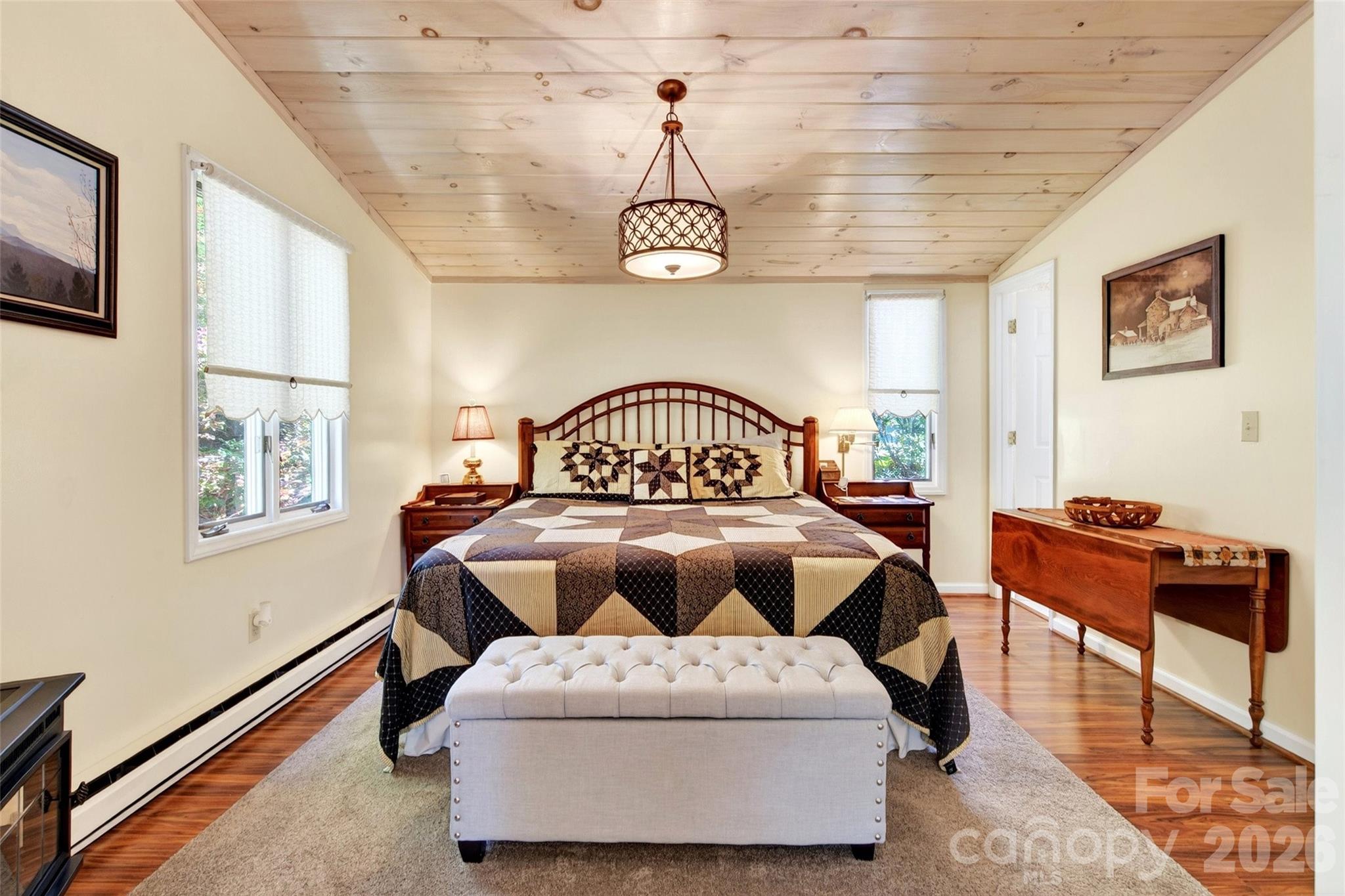 334 Harbor Lake Road Newland, NC 28657 - Photo 20 of 48 a bedroom with a bed and a window