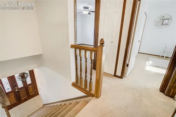 a view of front door with stairs