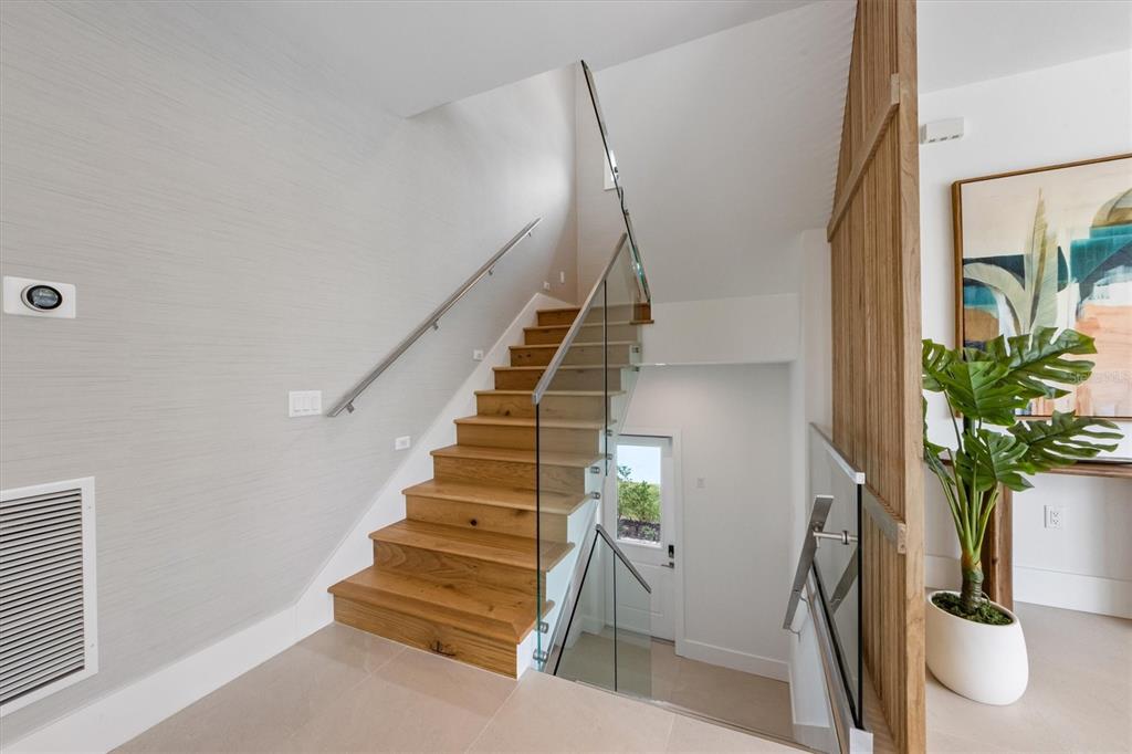 7003 Holmes Boulevard Holmes Beach, FL 34217 - Photo 27 of 70 a view of entryway and hall