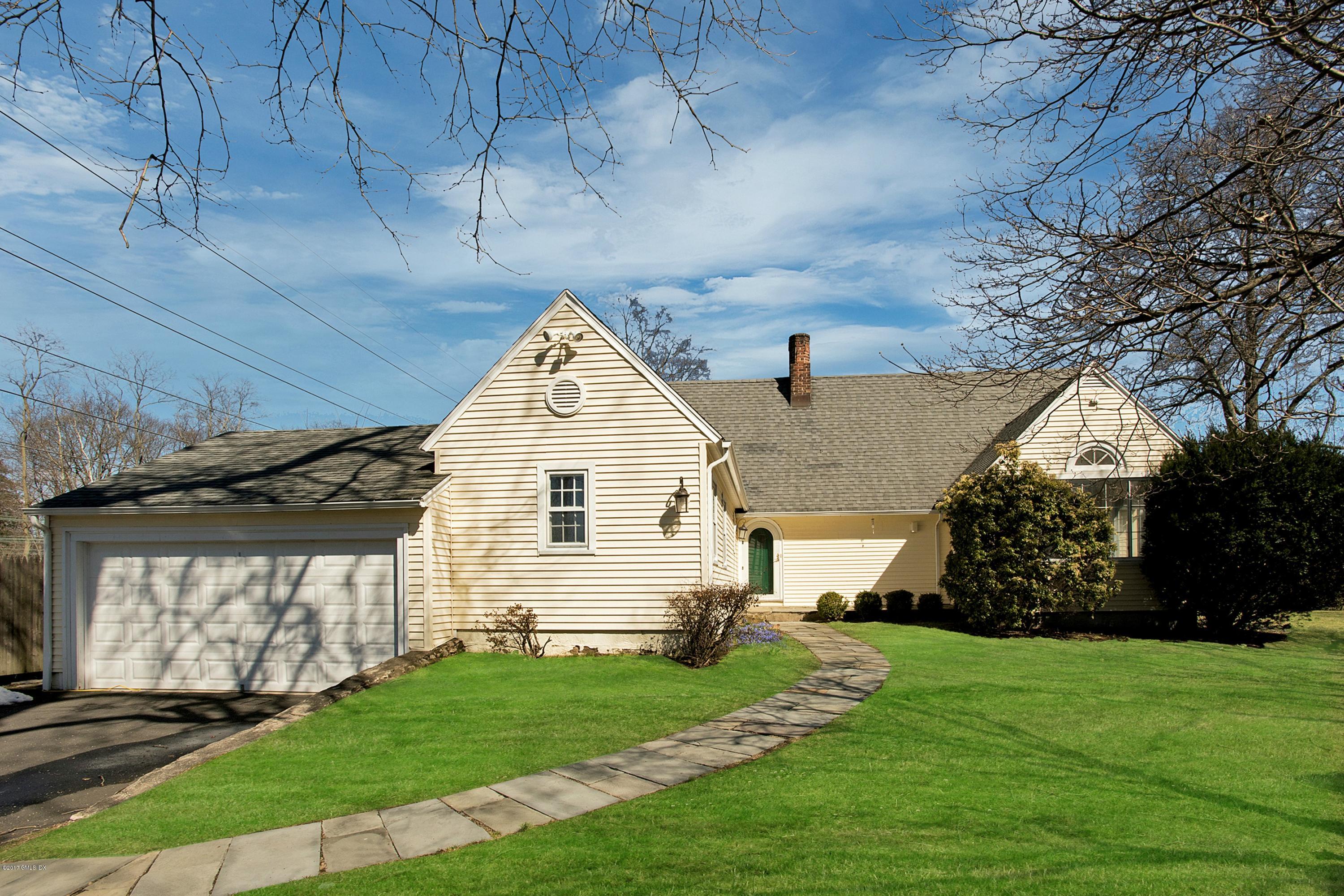 55 Oval Avenue Riverside, CT 06878 - Photo 15 of 19 a view of a back yard of the house