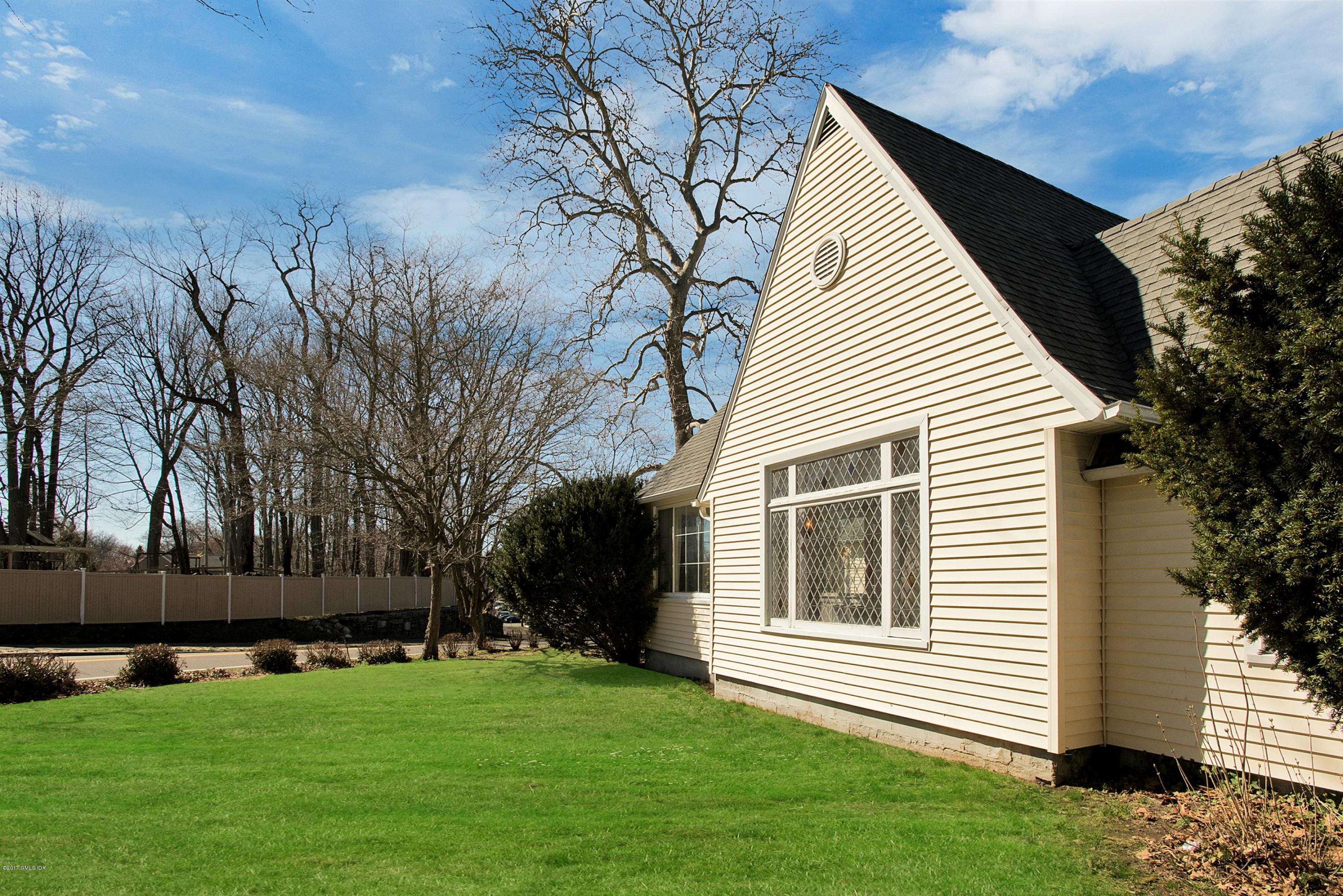 55 Oval Avenue Riverside, CT 06878 - Photo 19 of 19 a front view of house with yard