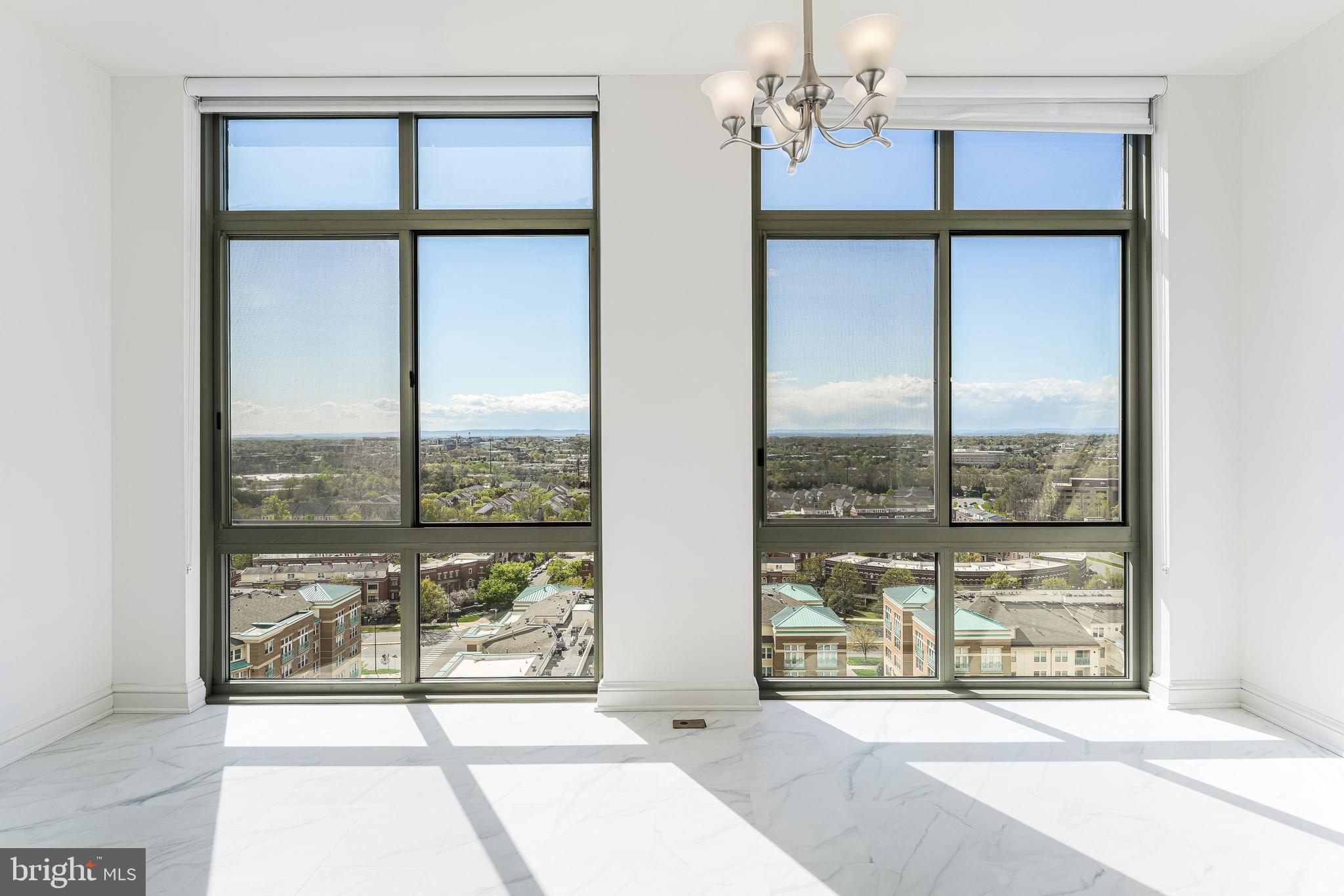 11990 Market Street, Unit 1414 Reston, VA 20190 - Photo 15 of 65 a view of a city from a windows