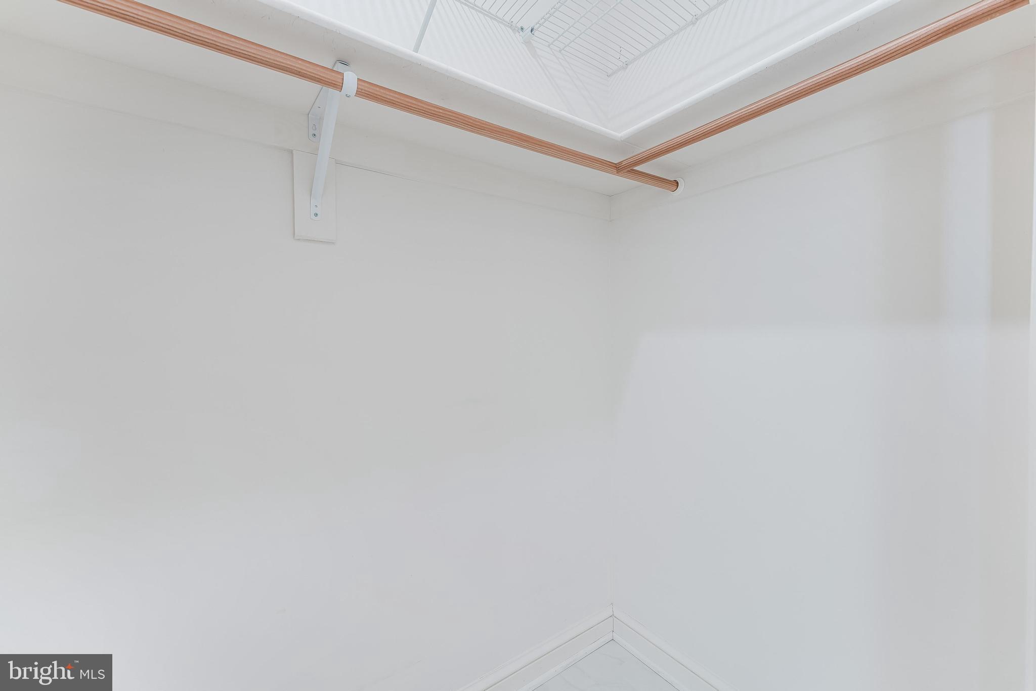 11990 Market Street, Unit 1414 Reston, VA 20190 - Photo 35 of 65 a view of a rack on the wall