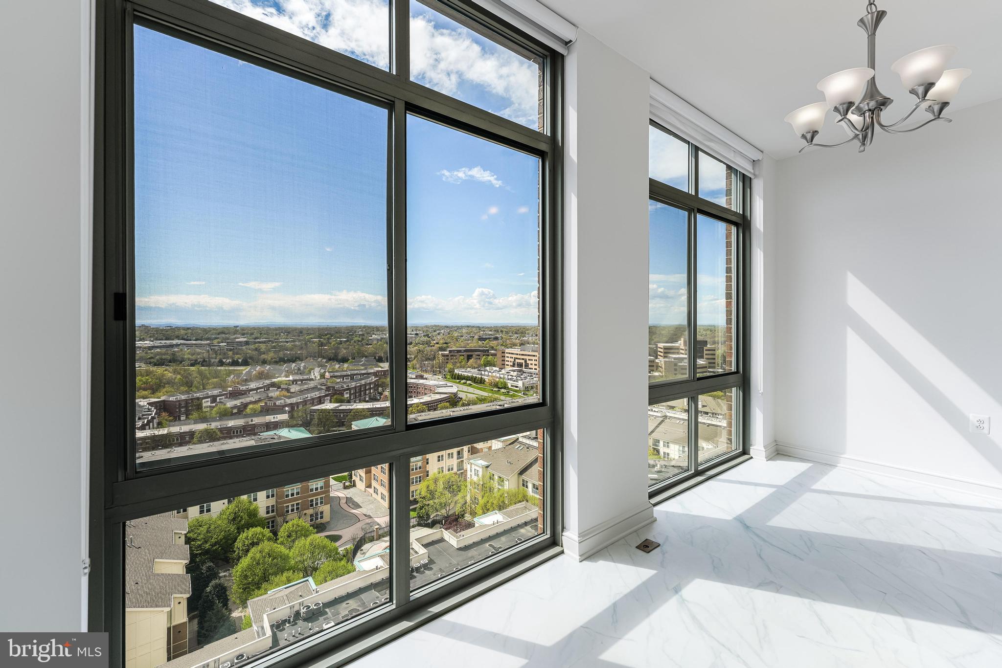 11990 Market Street, Unit 1414 Reston, VA 20190 - Photo 44 of 65 a view of a city from a windows